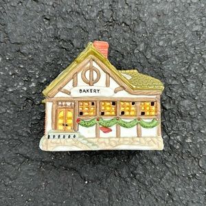 Ceramic bakery cottage from the 1996 Giving Set.